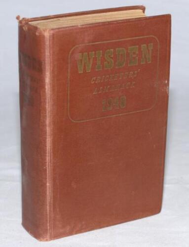 Wisden Cricketers' Almanack 1940. 77th edition. Original hardback. Limited number of copies printed in this war year. Some wear to boards, heavier wear to spine paper, dulled gilt titles to spine, small loss to gilt titles on front board, breaking front i