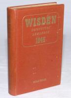 Wisden Cricketers' Almanack 1945. 82nd edition. Original hardback. Only 1500 hardback copies were printed in this war year. Minor marks to the front board, some dulling to the gilt titles on the spine paper, minor foxing to odd internal page otherwise in 