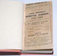 Wisden Cricketers' Almanack 1912. 49th edition. Bound in light brown boards, with original paper wrappers, with gilt titles to spine. Some irregular trimming to the front wrapper, minor marks, soiling and age toning to wrappers otherwise in good condition