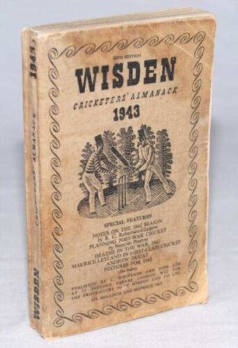 Wisden Cricketers' Almanack 1943. 80th edition. Original limp cloth covers. Only 5600 paper copies printed in this war year. Faded, worn and discoloured covers, signs of damp to covers and odd page extremities, internally odd faults, good - cricket