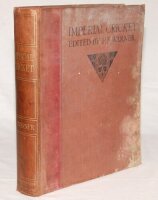 'Imperial Cricket'. P.F. Warner. London 1912. Limited Subscribers' Edition of 900 copies, this copy unnumbered. Signed to the subscriber/ limitation page 'E.H. Jones', dated 1925. Original red cloth with gilt to spine. Covers worn and stained. Some breaki