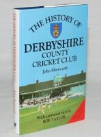 'The History of Derbyshire County Cricket Club'. John Shawcroft. Christopher Helm, Bromley 1989. Hardback with dustwrapper. Signed to the front and rear endpapers by forty six players, and to internal pages by two players, five signature on pieces laid do