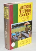 'A History of West Indies Cricket'. Michael Manley. London 1988. Hardback with good dustwrapper. Laid down to the half title page and page facing are an album page signed by fourteen West Indies players including George Headley, Clyde Walcott, Everton Wee