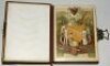 'Olympia' Victorian combined photograph album and musical box c1890. Designed by W.H.S. Thompson, H. Bunnett and others, made in Germany. The heavy leather bound album with padded boards embossed to the front with gilt title 'Olympia' and decorative borde - 2