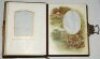 'Olympia' Victorian combined photograph album and musical box c1890. Designed by W.H.S. Thompson, H. Bunnett and others, made in Germany. The heavy leather bound album with padded boards embossed to the front with gilt title 'Olympia' and decorative borde - 4