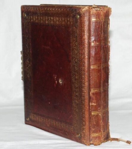 'Olympia' Victorian combined photograph album and musical box c1890. Designed by W.H.S. Thompson, H. Bunnett and others, made in Germany. The heavy leather bound album with padded boards embossed to the front with gilt title 'Olympia' and decorative borde