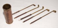Novelty brass and leather ornamental golf 'bag' with five miniature brass golf clubs with leather grips. Each club approx. 6.25" long. Make and date unknown, possibly c.1930s. G