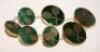 Tennis buttons. Set of seven brass and enamel tennis blazer buttons. The enamel green with gold crossed tennis racquets. 'London Badge & Button Co'. VG