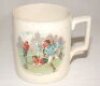 Victorian football mug. Colour scene of a match in progress to one side and roses to the reverse, on a pale cream background. Approx. 4" tall. Some signs of possible restoration, otherwise in good condition - football