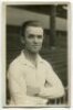 Frederick Ingram Walden. Tottenham Hotspur 1913-1924. Mono real photograph postcard of Walden, half length, in Spurs shirt leaning against the railings at the ground. Name 'F. Walden' in box to lower border. 'W.J. Crawford of Edmonton 1920'. Minor soiling