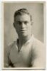 James Edward Elliott. Tottenham Hotspur 1912-1920. Mono real photograph postcard of Elliott, head and shoulders, in Spurs shirt. 'W.J. Crawford of Edmonton 1920'. Very good condition Postally unused - football<br><br>Jimmy Elliott played in 145 matches 