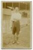 Edward Hughes. Tottenham Hotspur 1899-1908. Early sepia real photograph postcard of Hughes, full length in front of the stand, in Spurs attire. Title to lower border 'E. Hughes. Tottenham Hotspurs'. Jones Bros of Tottenham Postally unused. Some light fadi