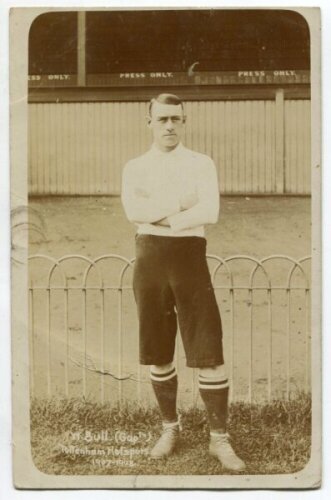 Walter Bull. Tottenham Hotspur 1904-1909. Early sepia real photograph postcard of Bull, full length in front oif the stand, in Spurs attire. Title to lower left hand corner 'W. Bull (Capt). Tottenham Hotspurs 1907-1908'. Jones Bros, Tottenham. Postally un