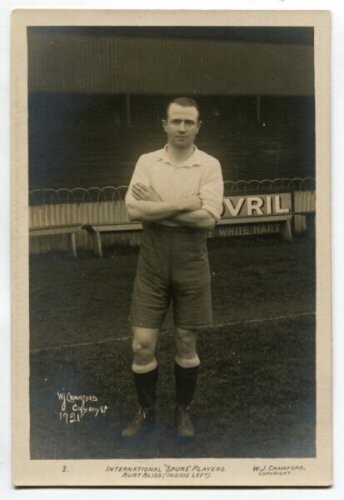 Herbert Bliss. Tottenham Hotspur 1912-1922. Early mono real photograph postcard of Bliss, full length, in Spurs attire. Title to lower border 'International Spurs Players. Burt Bliss (inside left). 'W.J. Crawford 1921' of Edmonton. Jones Bros of Tottenham