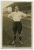 Vivian John Woodward. Tottenham Hotspur 1901-1909. Mono real photograph postcard of Wilson, full length, in England shirt in front of the main stand. Appears to be W.J. Crawford of Edmonton. Postally unused. Minor surface blemishes otherwise in good/very 