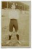 Thomas Scott Leslie. Tottenham Hotspur 1908-1911. Early sepia real photograph postcard of Leslie, full length, in Spurs attire. Jones Bros of Tottenham. Minor light fading, some surface marks, 'Gillingham' marked to lower border otherwise in good conditio