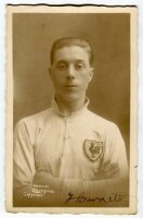 Fred W. Barnett. Tottenham Hotspur 1922-1928. Sepia real photograph postcard of Barnett, head and shoulders, in Spurs shirt. Signed in ink to lower border by Barnett. W.J. Crawford of Edmonton postcard. Postally unused. Good/very good condition - football