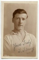 T. Tierney. Tottenham Hotspur circa 1920's. Sepia real photograph postcard of Tierney, head and shoulders, in Spurs shirt. Signed in ink 'Yours truly, T. Tierney'. W.J. Crawford of Edmonton postcard. Postally unused. Very good condition - football<br><br