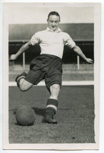 Albert Edwards Benjamin Hall. Tottenham Hotspur 1935-1947. Mono postcard size real photograph of Ward, full length, in Spurs attire about to kick the ball. Photograph by Dailypress Photographic Agency, with stamp to back. 4"x6". Good+ condition - football
