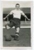 Albert Edwards Benjamin Hall. Tottenham Hotspur 1935-1947. Mono postcard size real photograph of Ward, full length, in Spurs attire about to kick the ball. Photograph by Dailypress Photographic Agency, with stamp to back. 4"x6". Good+ condition - football