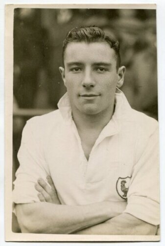 Almeric George Hall. Tottenham Hotspur 1934-1936. Mono real photograph of Hall, half length, in Spurs shirt. Printed title to back of card 'A. Hall. Tottenham. H.F.C.'. Photograph by Albert Wilkes & Son of West Bromwich, with stamp to back. 4.25"x6.5". Ir