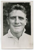 Charles Jones. Tottenham Hotspur 1934-1936. Mono postcard size real photograph of Jones, head and shoulders, in Spurs shirt. Photograph by Dailypress Photographic Agency, with stamp to back. 4"x6". Good+ condition - football<br><br>Charlie Jones, a centre