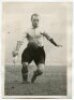 Isaac Spelman. Tottenham Hotspur 1937-1940. Mono real photograph of Spelman, playing in a match, in Spurs attire. Photograph by British International Photos, with stamp to back. 4.75"x6.5". Good+ condition - football<br><br>Taffy Spelman featured in 44 ma