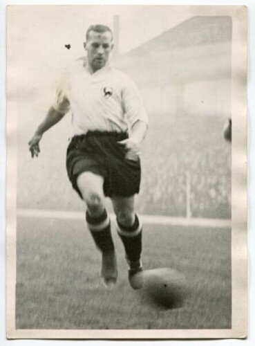 Ralph Ward. Tottenham Hotspur 1936-1946. Mono real photograph of Ward, playing in a match, in Spurs attire. Photograph by British International Photos, with stamp to back. 4.75"x6.5". Good+ condition - football<br><br>Ward joined Spurs in March 1936, he f