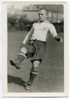 Isaac Spelman. Tottenham Hotspur 1937-1940. Mono real photograph of Spelman, practising on the pitch, in Spurs attire. Name typed to verso. Photograph by City Press, with stamp to back. 4"x6". Good+ condition - football<br><br>Taffy Spelman featured in 44