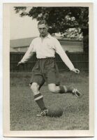 Leslie Francis Howe. Tottenham Hotspur 1930-1946. Mono postcard size real photograph of Howe, practising on the pitch, in Spurs attire. Name typed to verso. Photograph by City Press, with stamp to back. 4"x6". Very good condition - football<br><br>Les How
