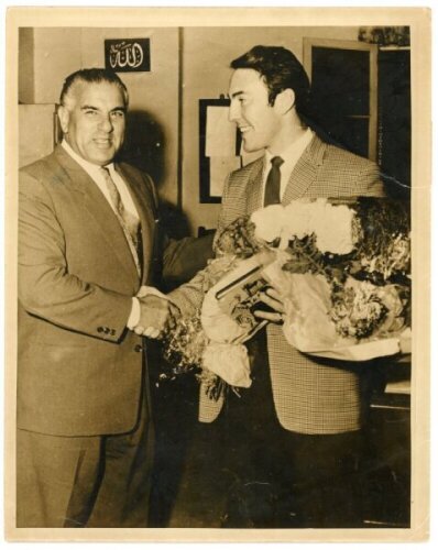 Tottenham Hotspur early 1960s. Original sepia press photograph of Jimmy Greaves being greeted by the President of the Egyptian Football Federation, on arrival in Cairo, probably 1962. Central Press Photos. Sold with a sepia press photograph of England tea