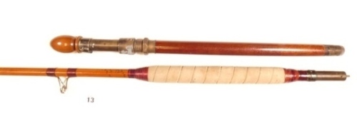 A Hardy "No.4 Salt Water" cane big game rod, 6'10", 23lbs t/c, crimson silk wraps, detachable wooden handle with brass screw grip reel fitting, studlock joint and felt foregrip, Sildur bridge rings, over and under top eye, 1947, slight crazing to varnish