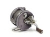 A scarce Hardy H.J.S. bait casting outfit, comprising; a right hand wind HJS bait casting reel with black anodised finish, 4:1 ratio gearing, reverse tapered ebonite handle on off-set curved crank winding arm mounted above a four point capstan drag adjust - 2