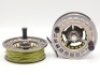 A fine Sage Spectrum Max 10/12 saltwater big game fly reel and spare spool, large arbour model with silver anodised finish, counter-balanced handle, skeletal frame, milled drum locking nut and rear graduated spindle mounted tension adjuster, as new condit - 3