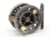 A scarce Richard Carter Aerial Firefly 2 ¾" No.6 trout fly reel and block leather case, shallow cored drum with ventilated flanges, counter-balanced ivorine handle and spring release fork, rear ivorine tension adjuster, brass line guide, distressed leaded