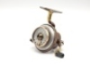 An Illingworth No. 3 threadline casting reel, ebonite handle, exposed bronze gearing, finger pick-up line guide, bronze rimmed alloy drum with graduated tension adjuster, in original rexine case, circa 1916