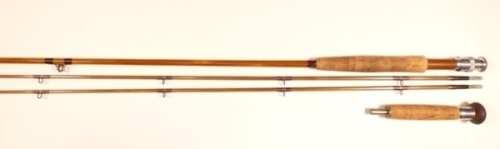 An E.F. Payne 2 piece (2 tips) cane single handled salmon fly rod, 9', 6 ½ozs., tan silk wraps, Spanish cedar reel seat with ally screw grip fitting, stamped makers cartouche, extension butt handle, suction ferrule, agate lined butt ring, spare tip with 