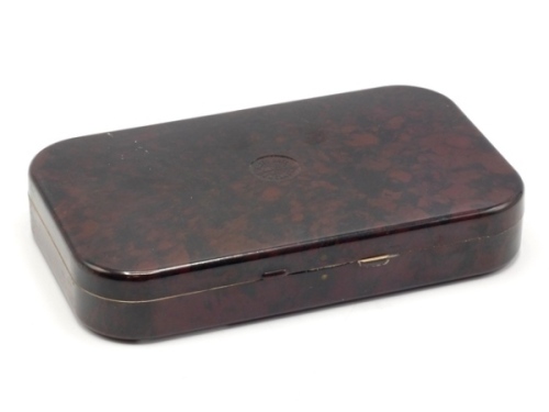 A Hardy Neroda No.4 bakelite dry fly box, oxblood finish, cream painted interior fitted fourteen compartments below five sliding celluloid lids, only light signs of use, 1940's