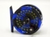 An Abel TR Light trout fly reel, blue/black abstract design anodised finish, rosewood handle, spring drum latch, fixed check mechanism, block foot, rosewood spindle cap, in pouch and the matching Abel "FF 803-4" 4 piece carbon trout fly rod, 8', #3, blue