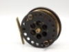 A rare Allcock Schooling No.1 3 ½" centre pin reel, brass backed drum with perforated ebonite front flange, counter-balanced horn handle, milled brass spindle tension nut and ventilated walnut arbour, ebonite rear plate with brass starback foot, stamped