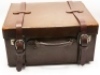 A rectangular dark tan leather tackle hold-all, green baize interior with lift-out tackle tray and compartmentalised base section, twin hasp locks and wrap-around strap holding a selection of salmon and trout flies contained in various boxes, including a 