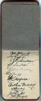 John William Hearne. Middlesex & England 1909-1936. Maroon autograph book containing the ink signatures of the Australian team who played England in the first Test of the 1924/25 Ashes series played at Sydney. Signatures are Collins, Ponsford, A.J.Richard