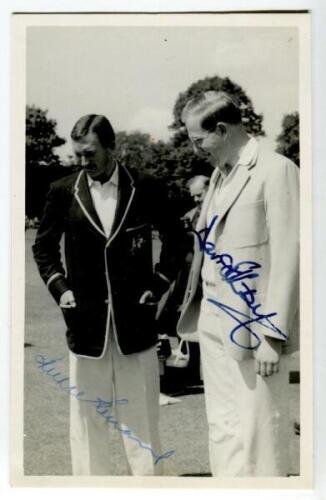 Australian tour of England 1961. Mono plainback postcard showing Australian Captain, Richie Benaud and Cambridge Captain, David Kirby, both in blazers inspecting the wicket at Fenners on the 17th May 1961, prior to the match. Signed in ink by both Captain