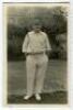 George Rubens Cox. Sussex 1895-1928. Mono real photograph postcard of Cox standing full length wearing cricket attire and Sussex cap. Very nicely signed in blue ink by Cox to iamge. Blind embossed stamp for Nias of Brighton to lower edge. Minor ink stain 