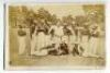 Australian Aboriginal tour to England 1868. Small original sepia photograph of twelve members of the Aborigines touring party, nine standing in a row, with three on the ground in front. Players’ names are Cuzens, Tiger, Charlie, Mullagh, Lawrence (Captain