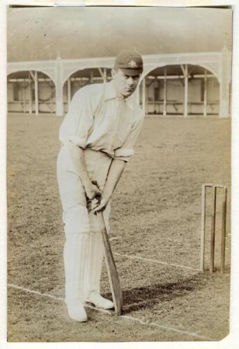 Warren Bardsley. New South Wales & Australia 1903-1926. Original sepia photograph of Australian batsman Warren Bardsley in batting pose, wearing Australian cap, in front of the wicket on the nursery ground at Lord’s in 1909