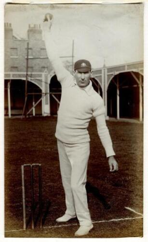 John Denis Alphonsus O’Connor. New South Wales, South Australia & Australia 1904-1910. Original sepia photograph of Australian bowler Jack O’Connor in bowling pose at the side of the wicket, wearing Australian cap, on the nursery ground at Lord’s in 1909