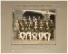 ‘Bodyline’. ‘M.C.C. Team- Australian Tour- 1932-33’. Large and impressive official mono photograph of the M.C.C. touring party who toured Australia in 1932/33. The team, standing and seated in rows, wearing M.C.C. touring blazers and cricket attire. The p