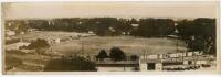 M.C.C. tour to South Africa 1938/39. Original mono panoramic press photograph of the Newlands Cricket Ground with a match in play and crowds in attendance. Press caption to verso describes, ‘A view of Newlands Cricket Ground, Capetown, where the second Te