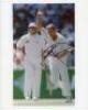 Shane Warne. Two colour press photographs, each signed to the photograph by Warne. Images depict a close-up of Warne in bowling action wearing sunglasses, and Warne celebrating taking a wicket against England. Both 10”x8”. VG - 2